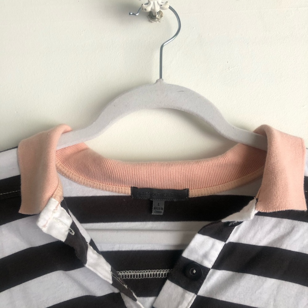 Popped trim black and white striped polo